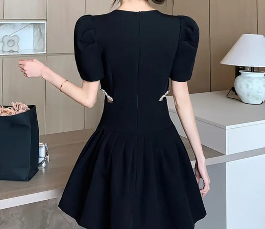 French bubble sleeve hollow waist fake two-piece dress female summer temperament high sense Hepburn wind A-shaped short skirt
